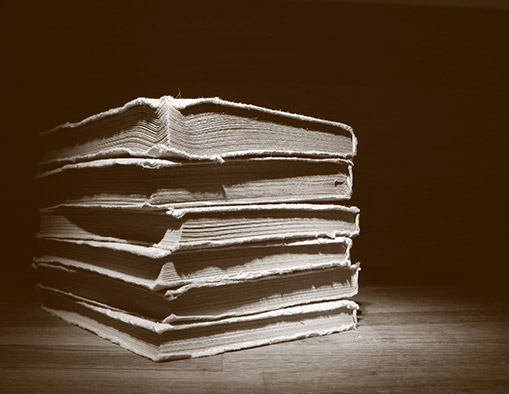Stack of books in grayscale